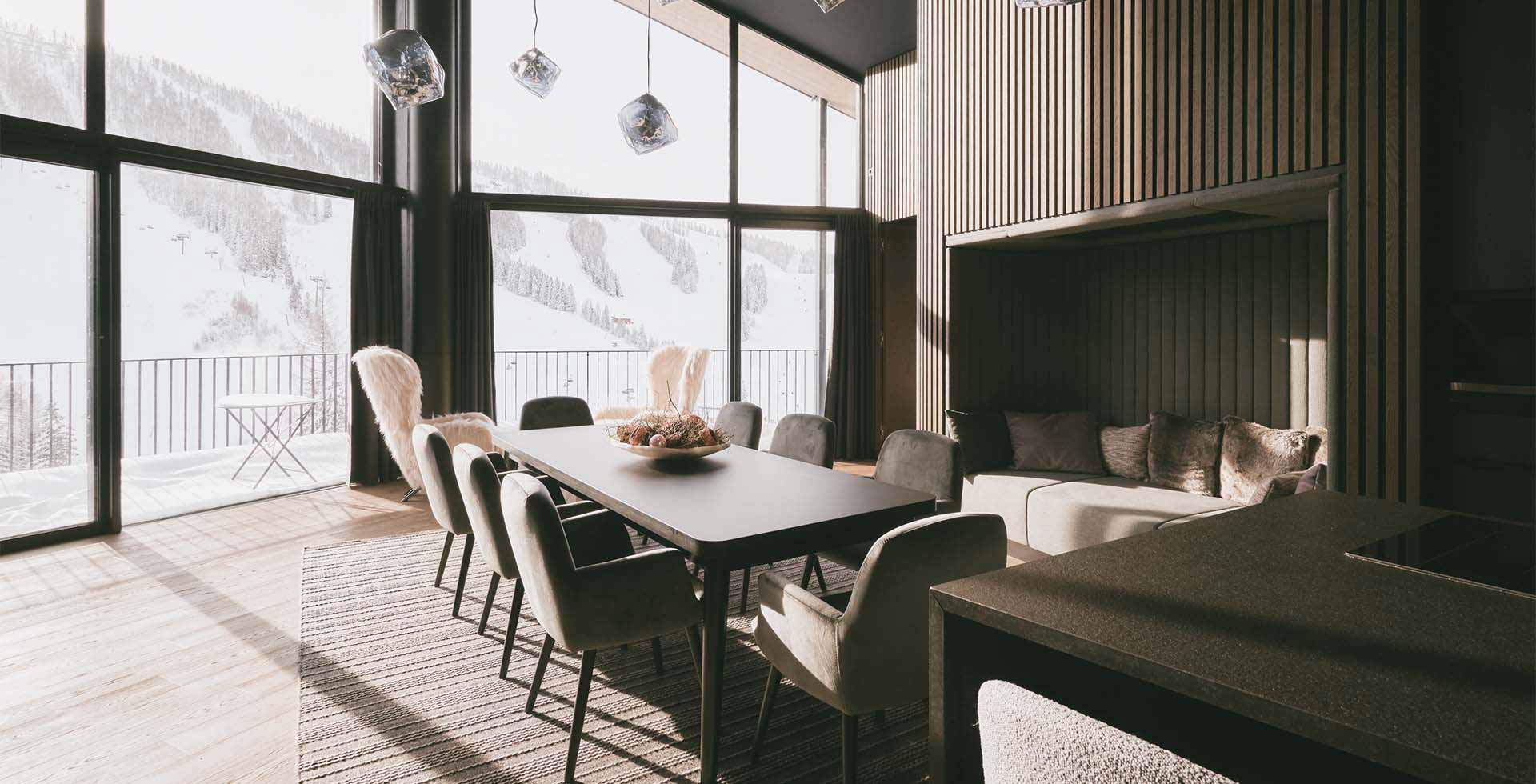 Stylish living area of the 2 bedroom Deluxe Penthouse Suite “Großer Priel” at the TRIFORÊT alpin.resort.