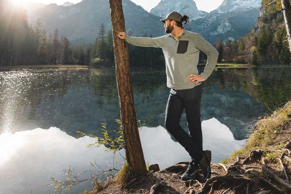 Mountain lake and panorama in the background during a summer hike on vacation at TRIFORÊT alpin.resort in Hinterstoder.